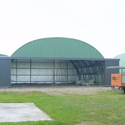 front view of an omega airplane hangar showing how wide the xxl doors can open