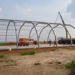 All spans in place and connected with purlins, the skeleton being almost completed.