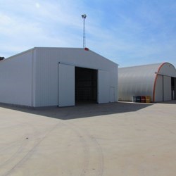 view of 2 steel industrial buildings made by Frisomat in Monte Mor, SP, the Delta has a traditional gable roof