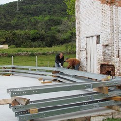 the spans consisting of beams and columns made of galvanized HSS steel, are assembled