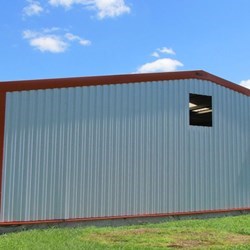 outside view of the facade with door and window, ventilation grade still needs to be installed