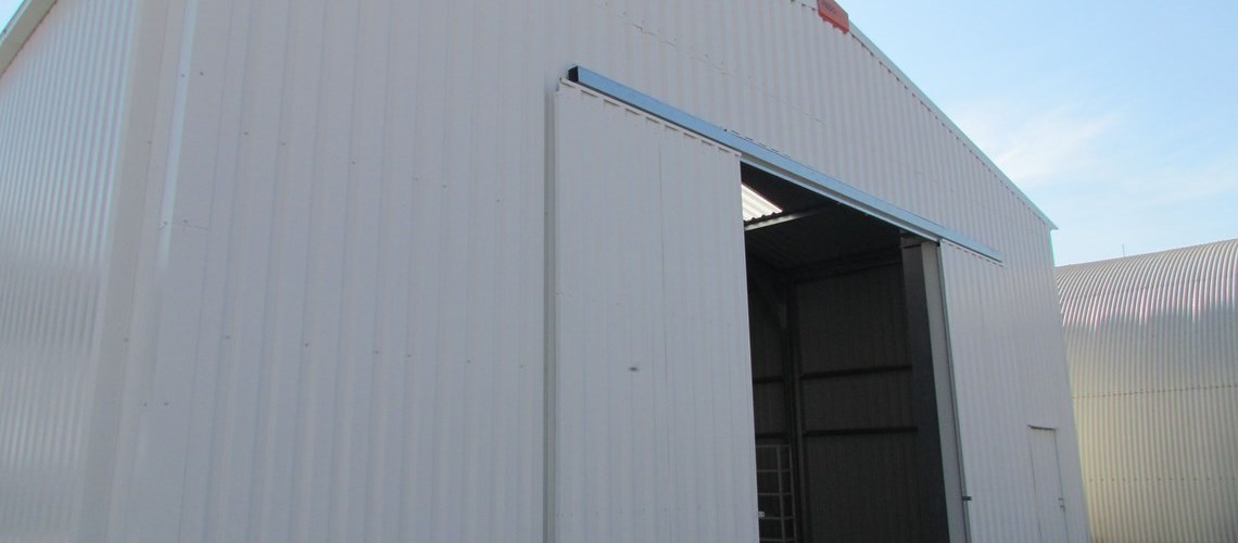Frisomat galpao express type delta front view, standard 2 foiled gate is open
